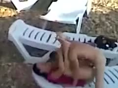 Spy livecam shows a lustful couple having missionary-style sex on a desolate beach.